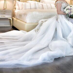 Galia Lahav custom wedding dress with 10ft long train and 3d handmade details